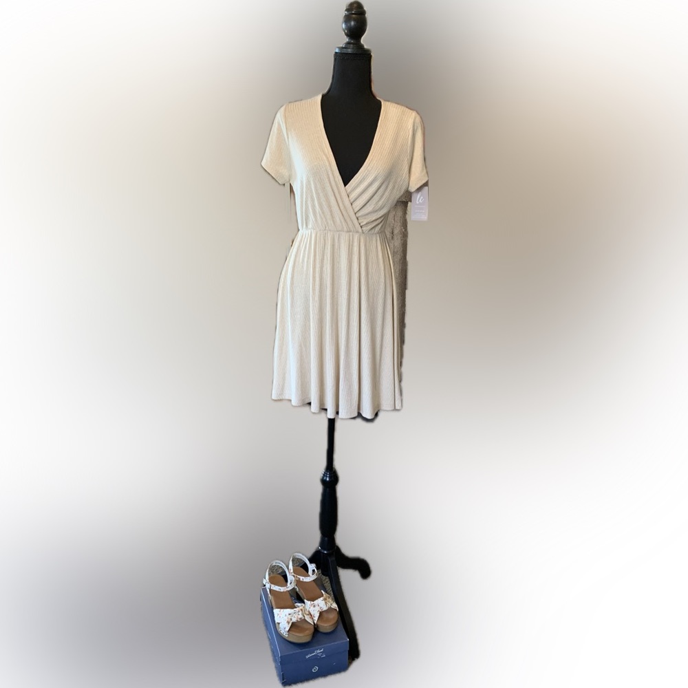 Women’s mini short, fit in flare flowing dress, size medium cream color
